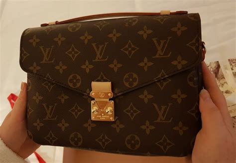 como saber cuando una bolsa louis vuitton es original|bolsas louis vuitton usadas originais.